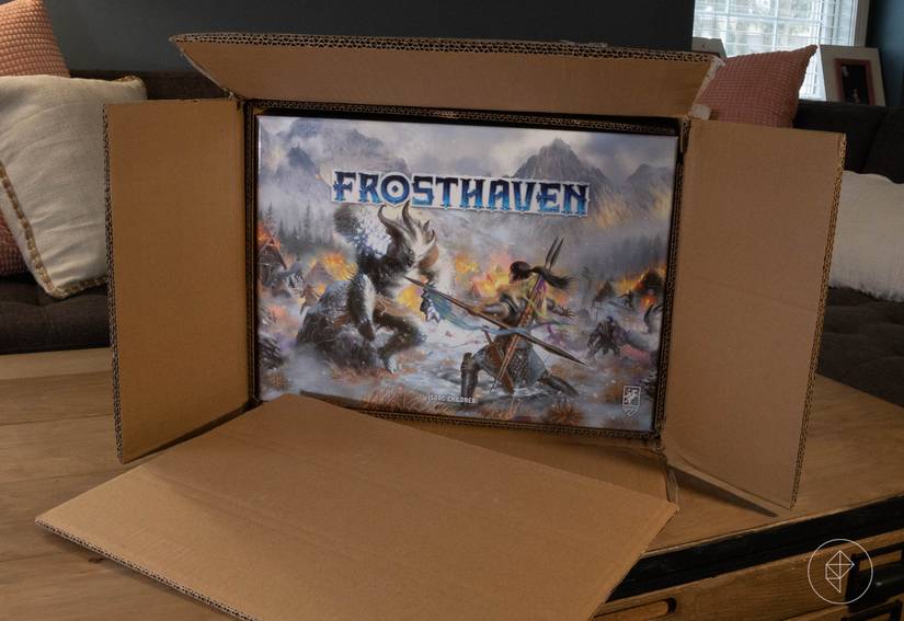 Frosthaven open, visible inside its cardboard shipping container.