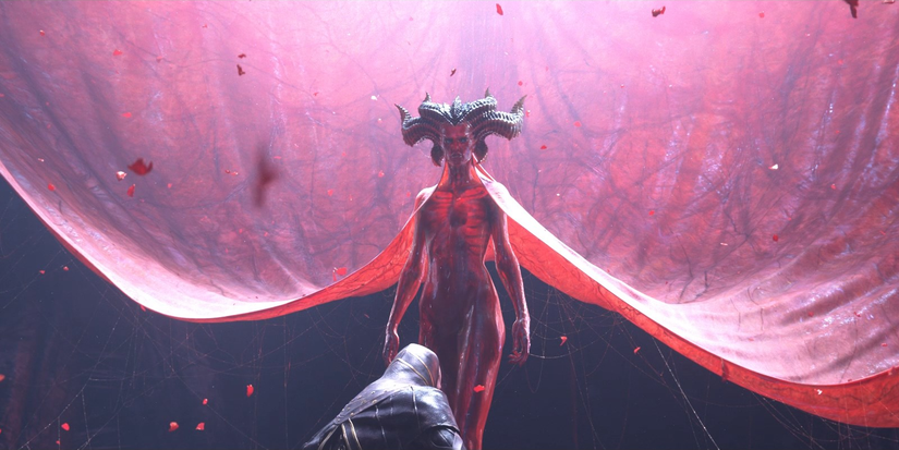 Red demon lady with horns, a visible beating heart, and a huge red cape stood behind a kneeling person. AKA Lilith in Diablo IV / 4