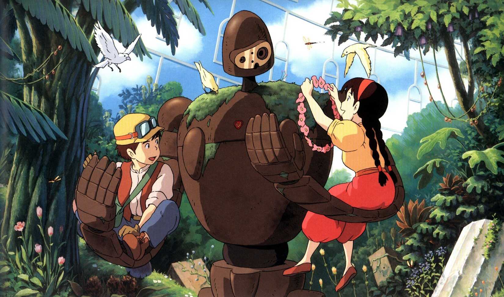 (L-R) Pazu (Mayumi Tanaka) and Sheeta (Keiko Yokozawa) sitting in the arms of a Laputan robot surrounded by exotic trees, birds, and flowers in Laputa: Castle in the Sky.