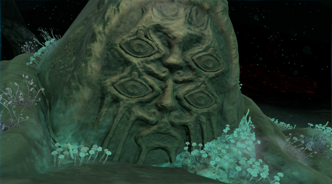 The face of a bargainer statue in Tears of the Kingdom, which has several eyes and a pointy hood-shaped head. Moss and glowing green flora grows around the base of the ominous statue.