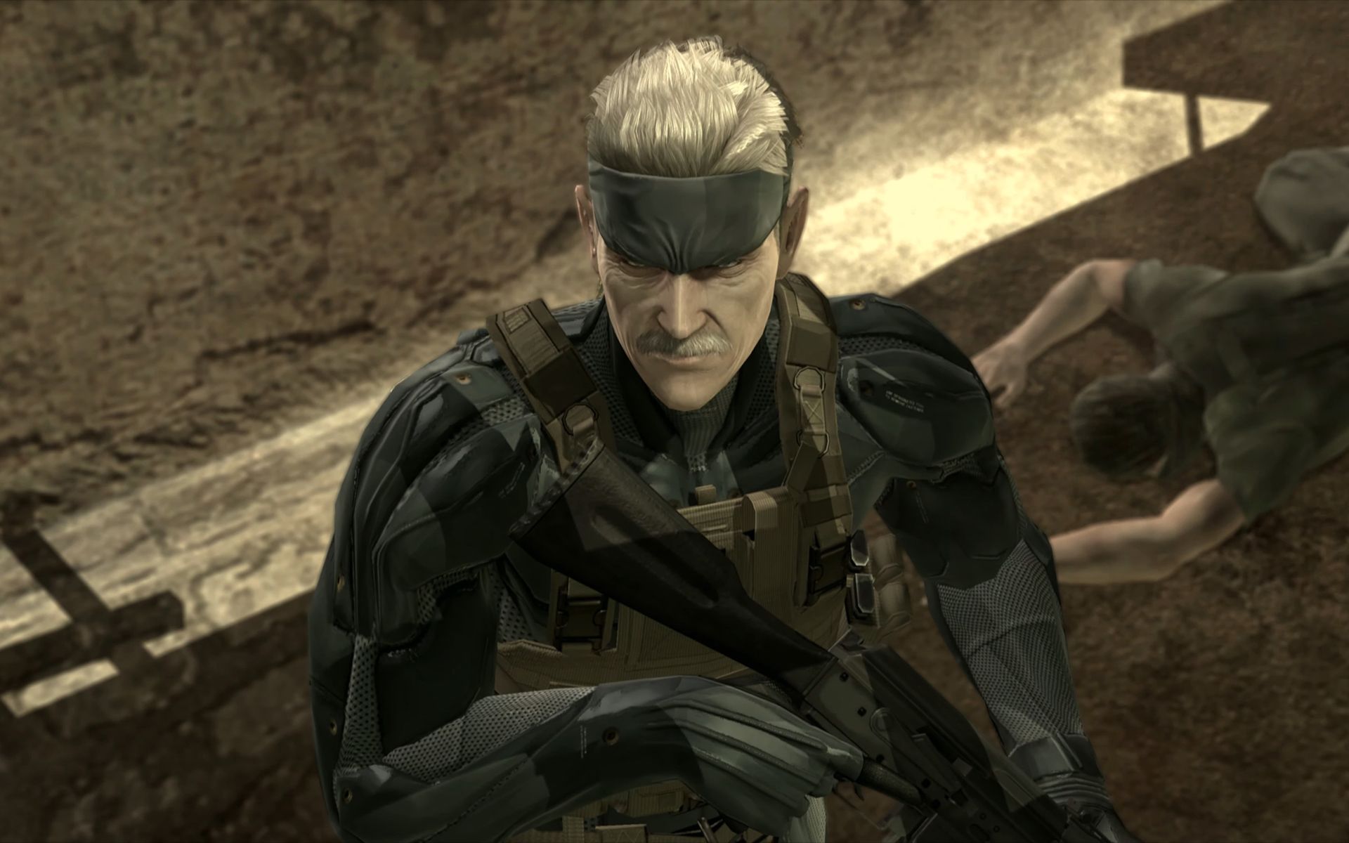Solid Snake stands in a deserted city street in a screenshot from Metal Gear Solid 4: Guns of the Patriots