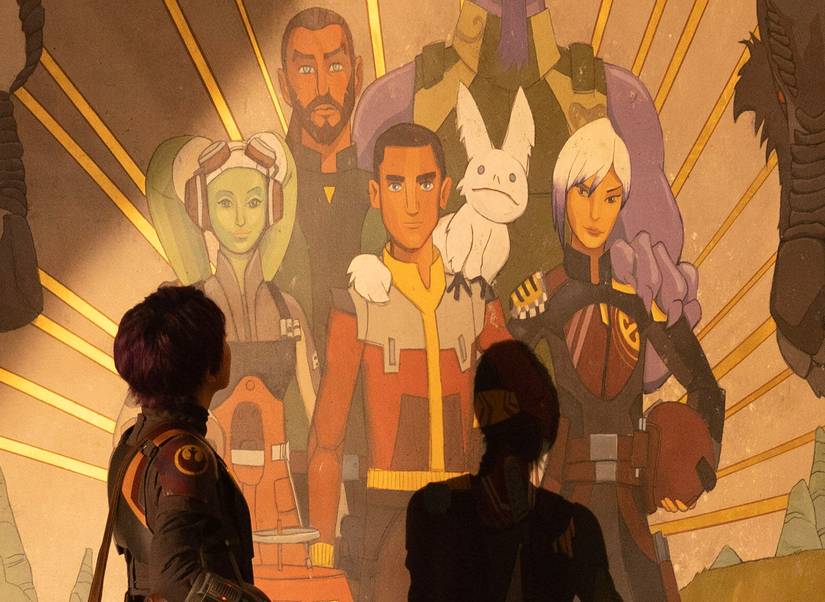 Sabine Wren (Natasha Liu Bordizzo) looks up at a mural of the crew of the Ghost (Ltr: Hera, Kenan, Ezra, Zeb, and Sabine). Ezra is front and center, depicted with a white loth-cat on his shoulder in Star Wars: Ahsoka. 