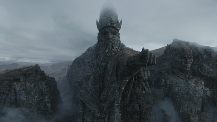 Gaylan stands on the outstreched arm of a massive statue of the Father, carved from a cliffside. On the father’s right is a carving of the Son, and on his left is a crumbled carving of the Daughter, its head gone, in Ahsoka.