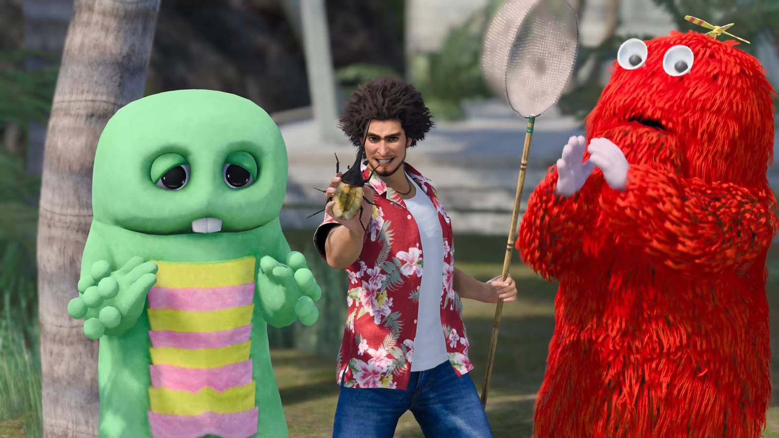 Ichiban Kasuga holds up a beetle he caught with a net, and is flanked by mascots Gachapin and Mukku, in a screenshot from Like A Dragon: Infinite Wealth.