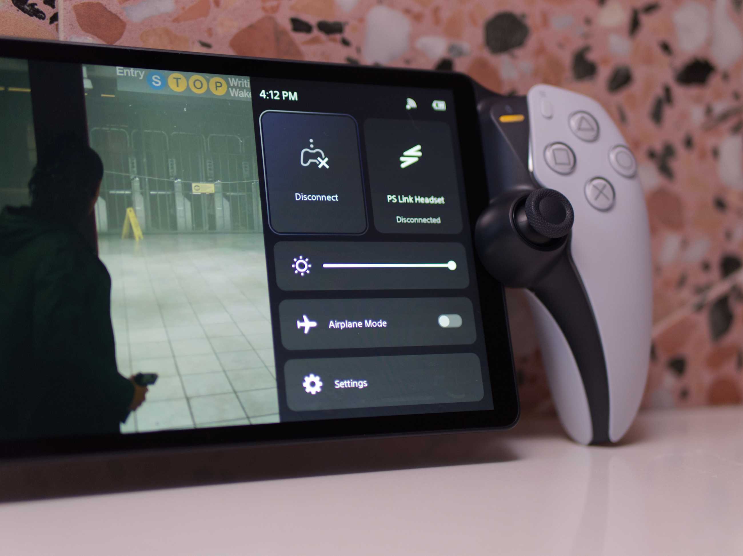 a close-up photo of the menu UI on the PlayStation Portal while it runs Alan Wake 2