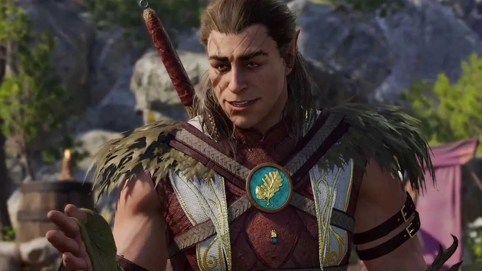 The druid companion Halsin speaks to a character offscreen, holding his hand aloft in explanation, in Baldur’s Gate 3