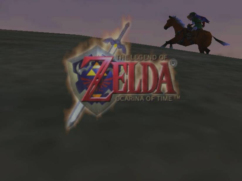 The title screen of Zelda: Ocarina of Time, showing the game’s logo with Link riding his horse in silhouette in the background