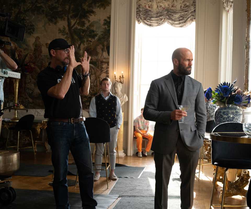 David Ayer directs Jason Statham on the set of The Beekeeper