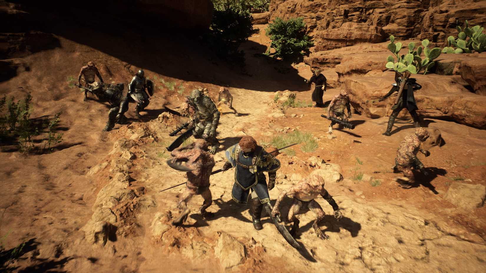 Adventurers are attacked by a messy mob of goblins in a sandy area in Dragon’s Dogma 2