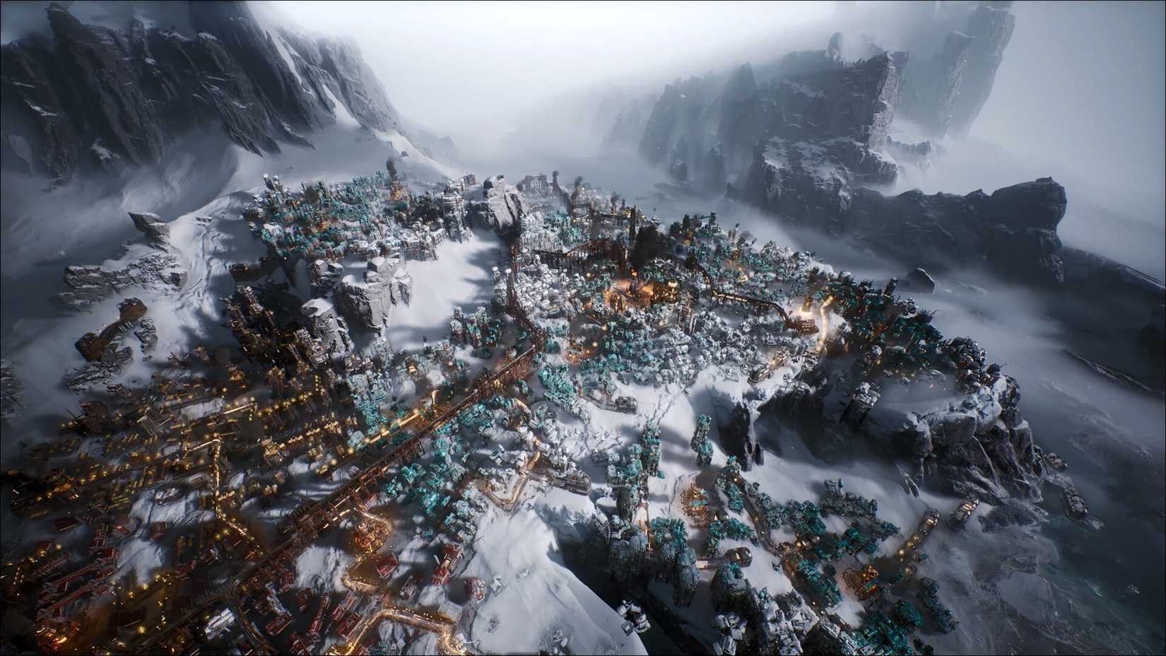 A city being built in the snow between some mountains in Frostpunk 2.