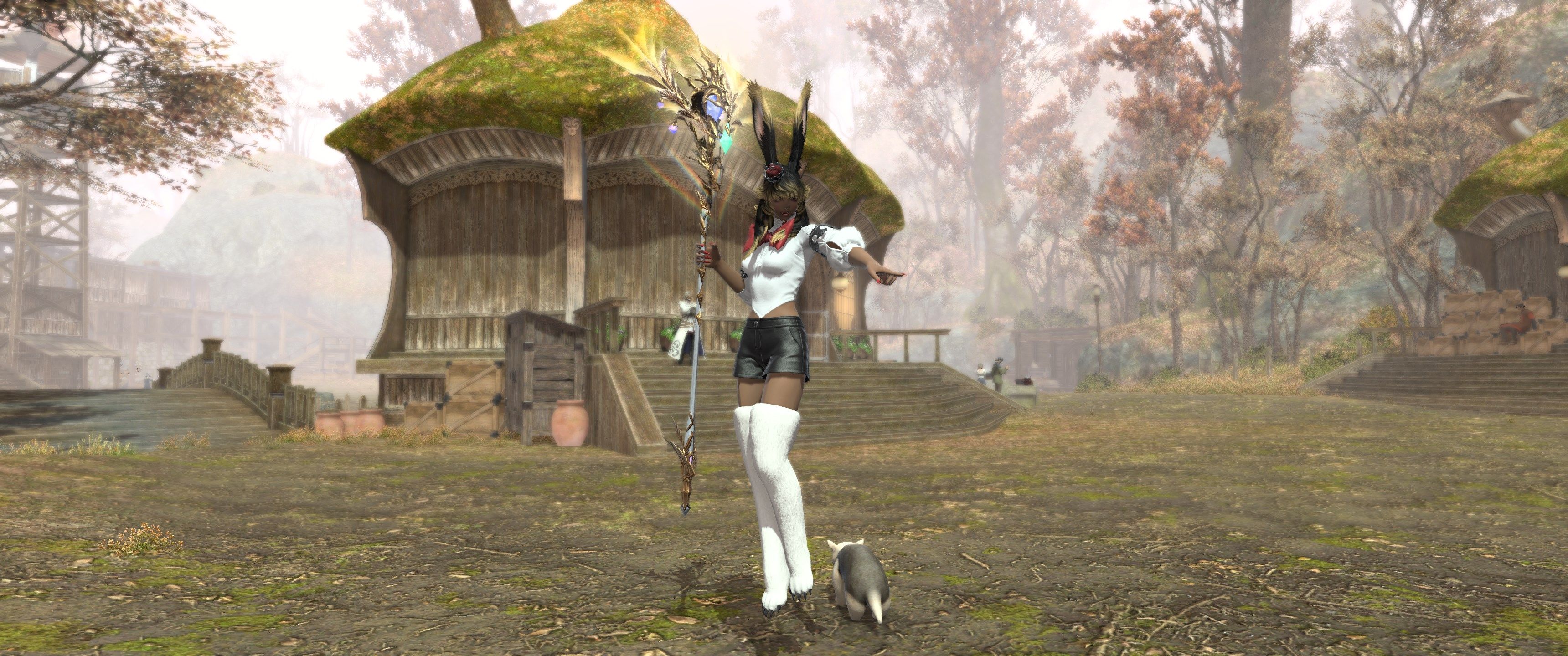 A Viera holds a Zodiac Zeta weapon while pointing in FFXIV