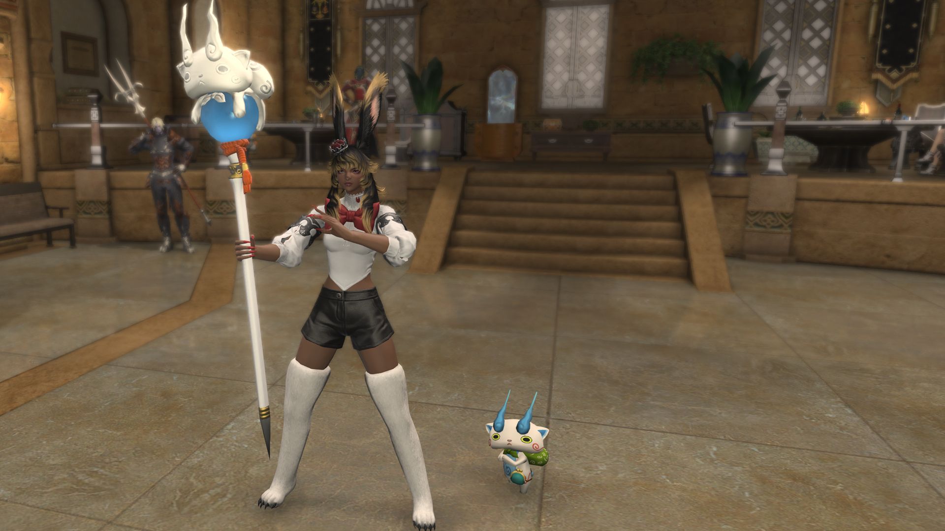 A FFXIV Viera holding a cane with a blue orb and cat at the top of it