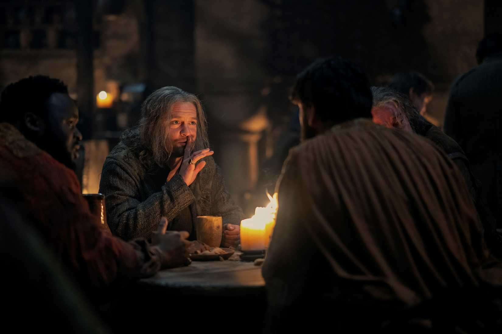 Ulf (Tom Bennett) in a tavern with friends