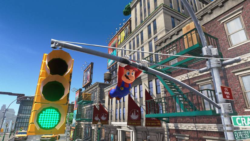 Super Mario Odyssey - Mario swings on a traffic light