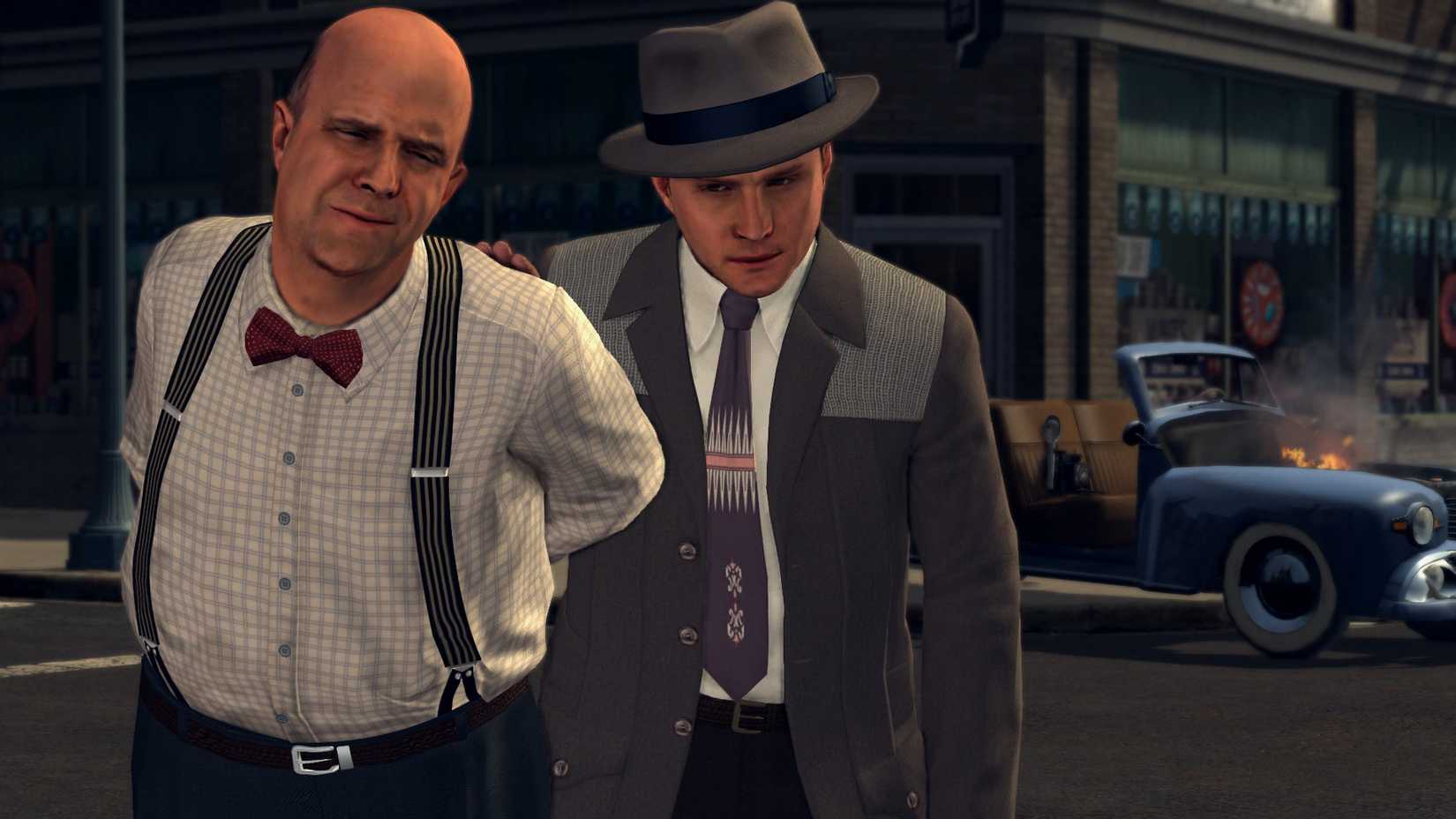 L.A. Noire on Nintendo Switch - Cole walks behind a handcuffed suspect