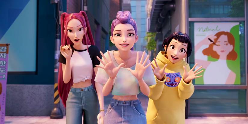 Rumi and the Huntr/x group excitedly engaging with fans