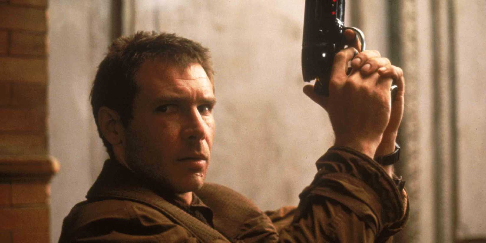 Rick Deckard holds up his gun in Blade Runner